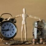 A toy compare clock and money