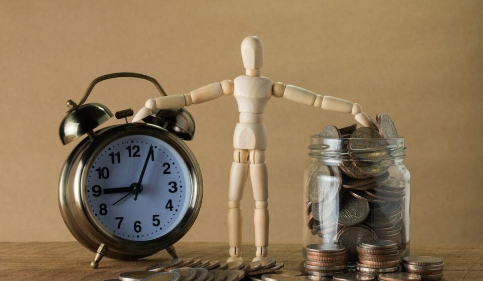 A toy compare clock and money